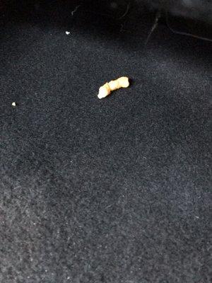 Cheeto underneath the passenger chair. CLEAN YOUR RENTAL CARS, BUDGET.