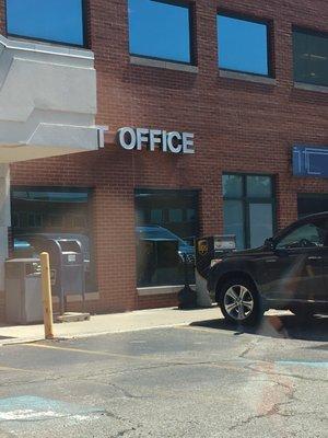 There's a mail drop-off bin right outside of the building that picks up 2x a day. There's also a UPS package drop-off bin!