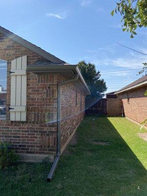 Side gutters with down spout added