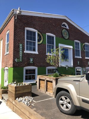 Parking area and back of building.