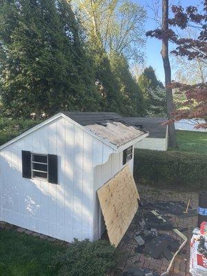 DURING. Removing double shingles.