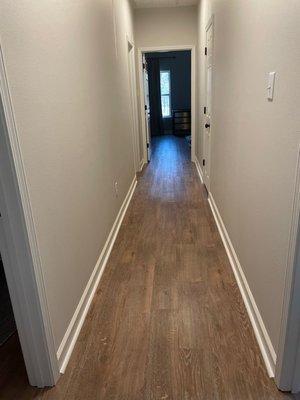 Hallway done in honey oak LVP