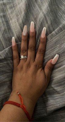 V white tip nails with glitter ombré ring finger