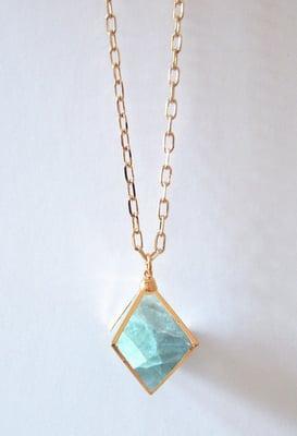 Large fluorite stone bezel set in 24k yellow gold.