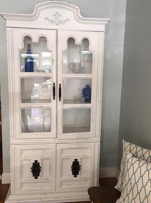 One of my favorites, white and shabby lighted cabinet.