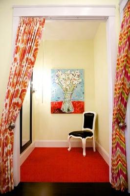 Cheerful, bright, and roomy dressing rooms.