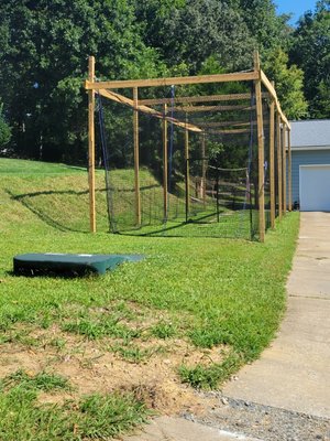 Batting cage and pitching mound for assessments and training