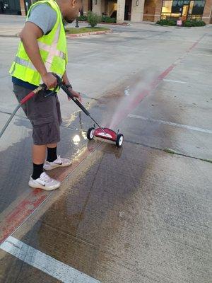 Pressure washing painted area before painting