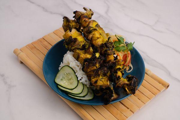 Mushroom skewers basted with a lemongrass herb marinade.