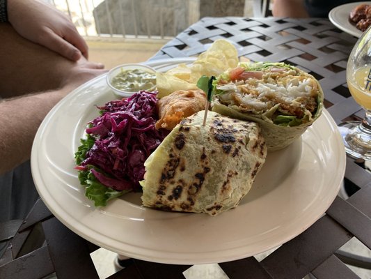 Fish wrap with extra fish, chips on the side