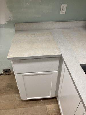 They didn't fabricate my countertop.  They cut it on the day of install.  The sample "atmospheric" is gray no variations but this...