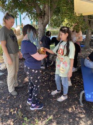 Animal husbandry workshop with a chicken and a goat!