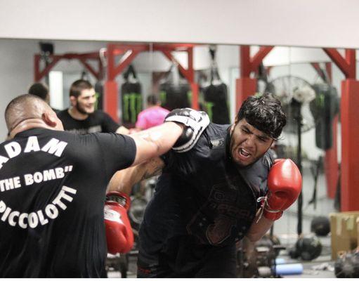 Coach Hector and UFC Contender fighter Eduardo "the Mexican Boogeyman" Perez