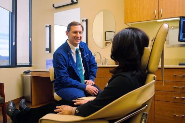 Dr. Ron Thoman with patient.