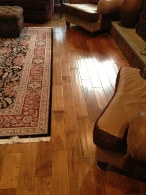 Wood can warm up any room. This distressed wood was an amazing choice for their cozy family room.