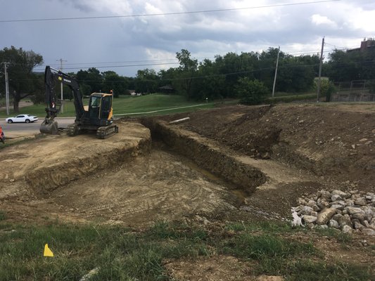 Dry well cut that will get lined and backfilled with 57 stone.