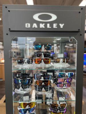 Oakley sunglass display case featuring various styles made by the brand