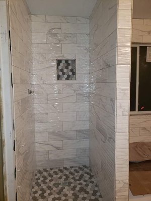 Installation of tile convert to shower n surrounding walls, floors, windows seals