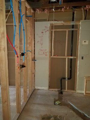 remodel plumbing for added shower