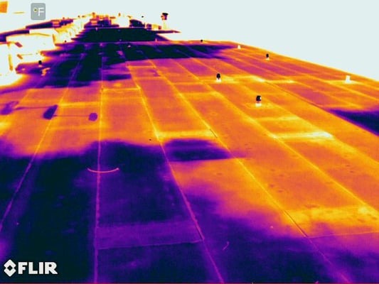 Infrared flat roof inspection - Trapped moisture shows clearly in this image - Infrared Imaging Services LLC