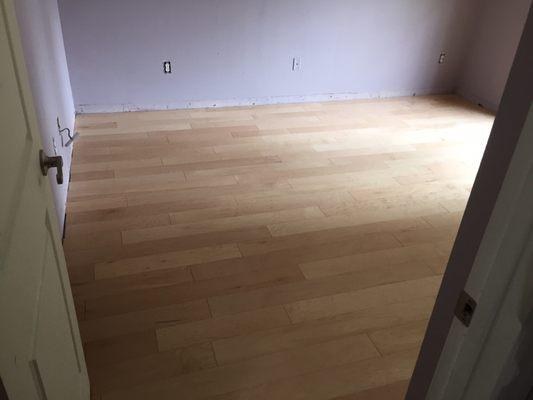 Hardwood floor in bedroom