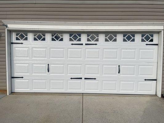 Customer is loving their new windows! The old door was solid door with no windows!