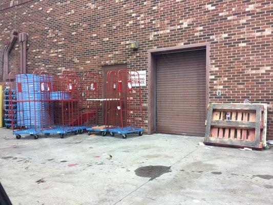 Speed carts blocking an emergency exit.