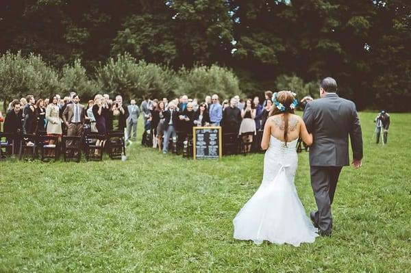 Wedding ceremony in the orchard at The Vineyard.