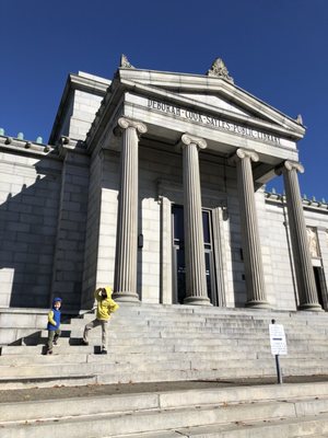 Front of the Library (entrance is to the right of it).