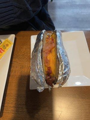 Sad "loaded baked potato" - hard, dry, ordered "loaded" and it came like this