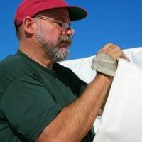 Working on the Mainsail I built for the 96 ft Research Vessel Odyssey