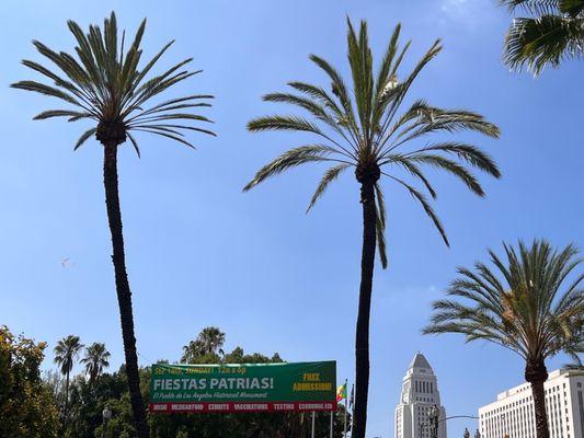 Fiestas Patrias signage with LA City Hall in distance