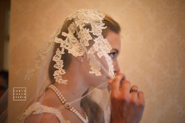 Bride with mother's wedding veil.