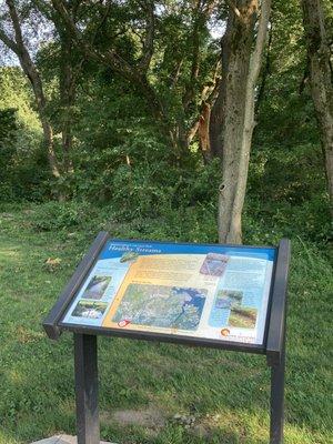 Nature signs providing information on the area/features. They're throughout