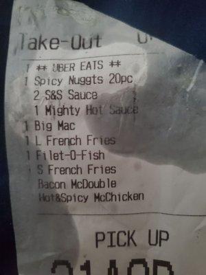 Greasy receipt with proof that spicy nuggets were in my order.