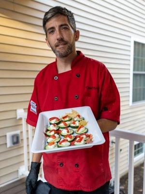 Cucumber rounds - whipped feta - topped with red pepper slice