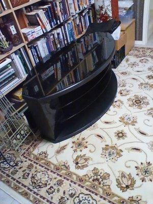 T V stand. Wood and glass.50" x27" x19" high.very good condition. Best offer takes it.