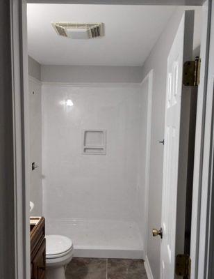 60" x 32" shower with chairrail trim.