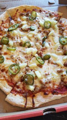 Sausage, jalapeno, pineapple pizza