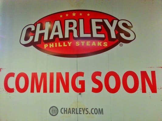 This location is closed and this big sign is up over where the Cinnabon used to be. Charley's is coming in its place