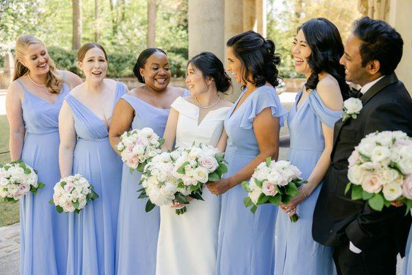 Floor-length bridesmaids dresses in periwinkle and lux chiffon by Bella Bridesmaids. Photo by Leigh Wolfe Photography.