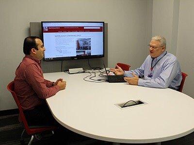 Business startup mentor at downtown Naperville coworking space.