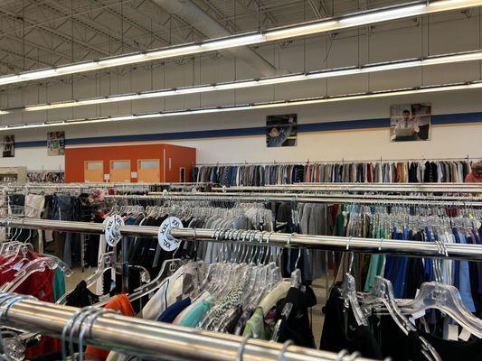 Racks of clothing.