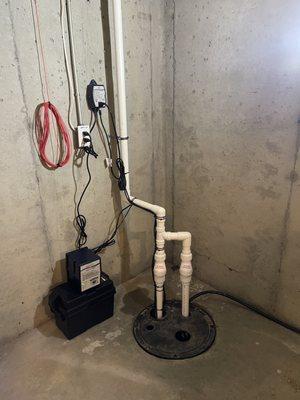 Sump pumps and battery backup system