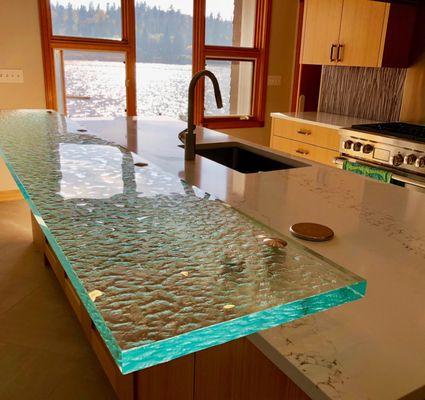 Custom kiln-formed countertop for a kitchen overlooking the water