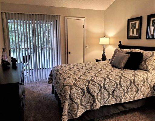 Bedroom with access to the screened patio/balcony