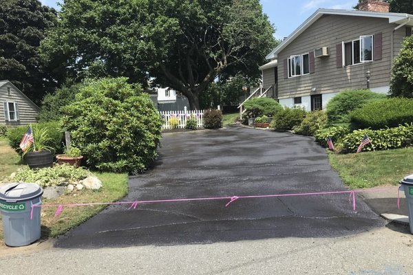 Customer requested sealer to be applied to driveway.