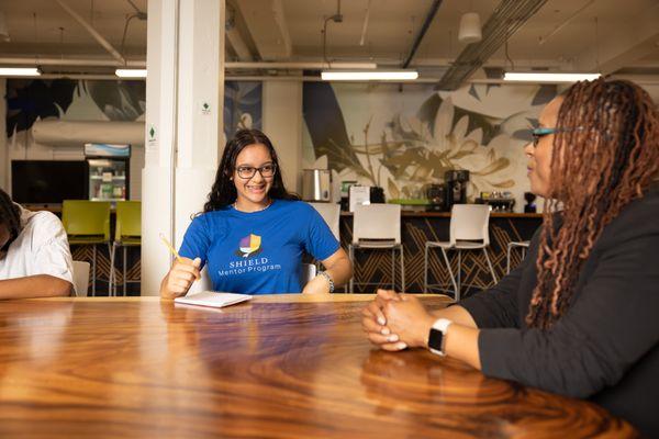 Young lady engaging in mentoring