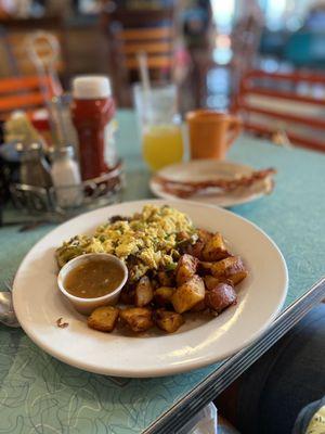 Breakfast burrito (no wrap) with potatoes (home fries), bacon, coffee, mimosa