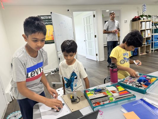 Robotics at play. Kids coding their Robots